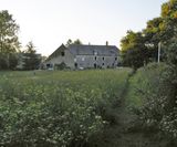 View of the house from the meadow. 